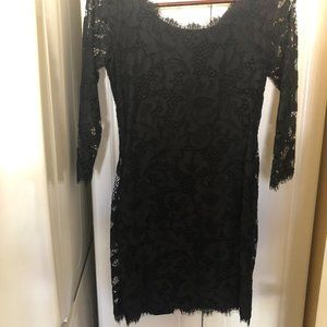 Beautiful Diane vonFurstenberg lined dress size 4, black, zip up in back.